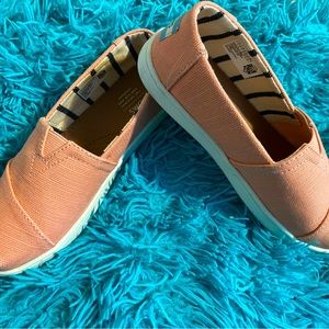 Toms size 2Y one time use .cute Easter color. Very vibrant and comfortable